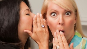 women-whispering-secrets