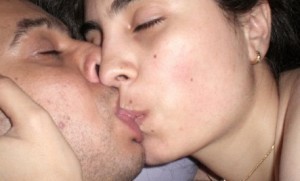 couple-kissing-photo-in-bedroom-300x181