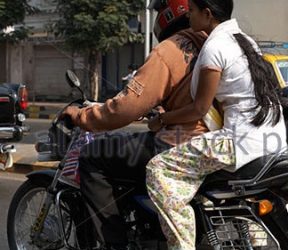 indian-couple-on-motorbike-bh2431